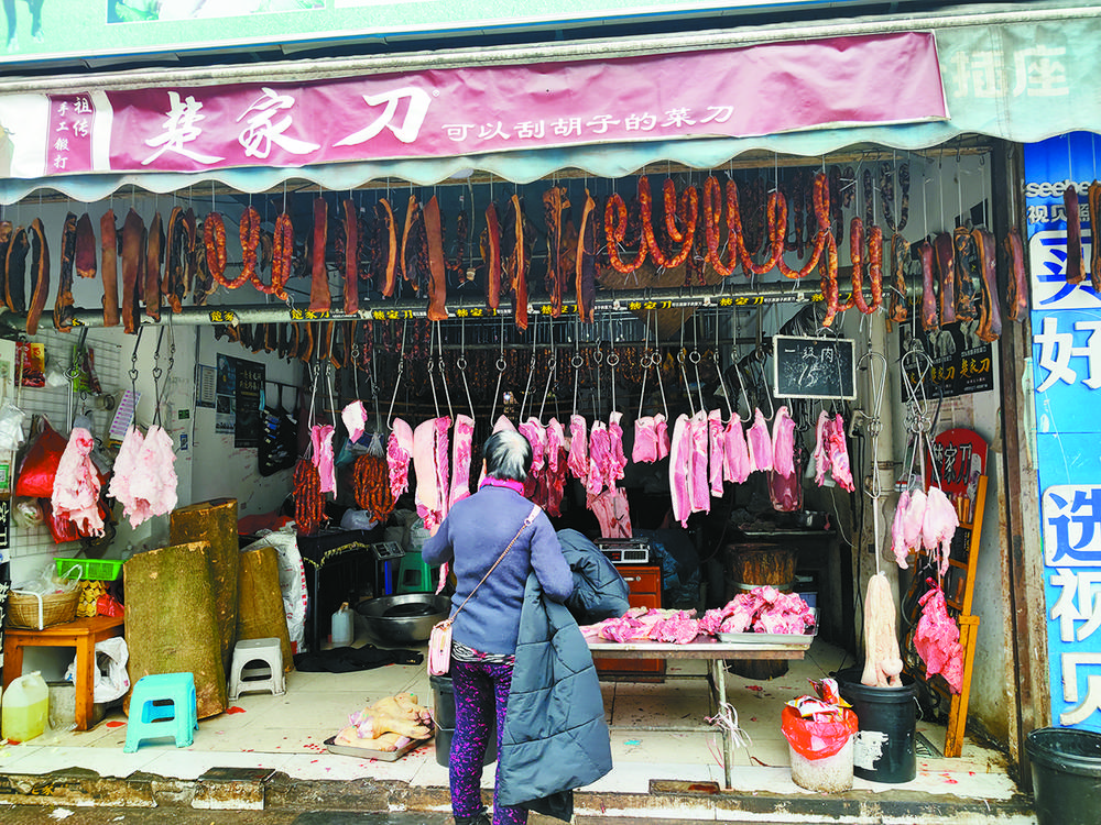 猪肉供应无忧—— 内江人的春节:“有的是肉！”